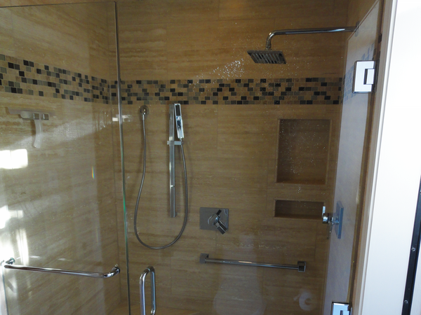 https://frei-remodeling.com/wp-content/uploads/2021/11/Shower-with-tile-walls-and-floor.png